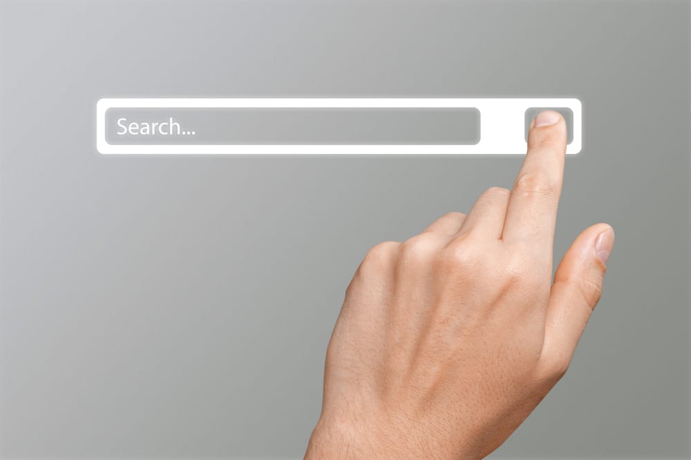 Human hand and internet search page